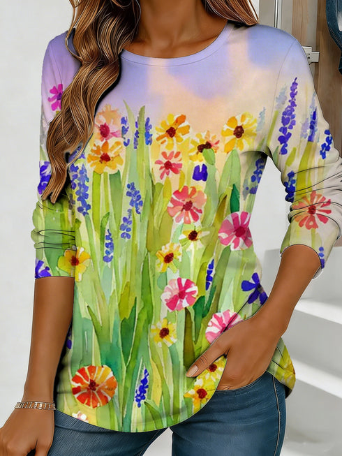 Women's blue floral watercolor print long-sleeved loose-fitting round neck top, casual, everyday, stylish and elegant.