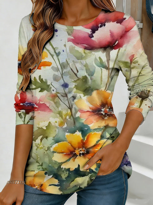 Women's blue floral watercolor print long-sleeved loose-fitting round neck top, casual, everyday, stylish and elegant.