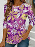 Women's blue floral watercolor print long-sleeved loose-fitting round neck top, casual, everyday, stylish and elegant.