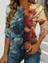 Women's blue floral watercolor print long-sleeved loose-fitting round neck top, casual, everyday, stylish and elegant.