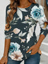 Women's blue floral watercolor print long-sleeved loose-fitting round neck top, casual, everyday, stylish and elegant.