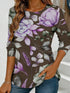 Women's blue floral watercolor print long-sleeved loose-fitting round neck top, casual, everyday, stylish and elegant.