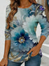 Women's blue floral watercolor print long-sleeved loose-fitting round neck top, casual, everyday, stylish and elegant.