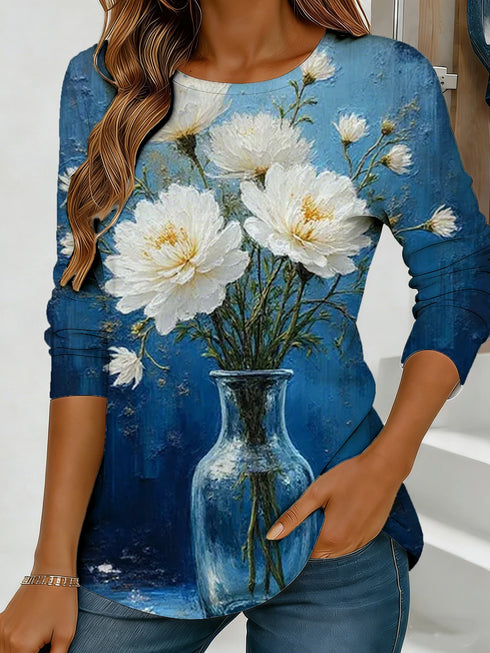 Women's blue floral watercolor print long-sleeved loose-fitting round neck top, casual, everyday, stylish and elegant.