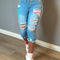 Women’s Ripped Capri Jeans with Raw Hem