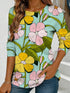 Women's blue floral watercolor print long-sleeved loose-fitting round neck top, casual, everyday, stylish and elegant.