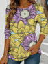 Women's blue floral watercolor print long-sleeved loose-fitting round neck top, casual, everyday, stylish and elegant.