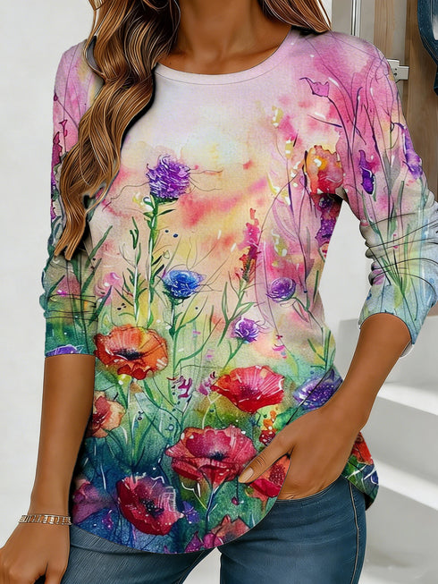 Women's blue floral watercolor print long-sleeved loose-fitting round neck top, casual, everyday, stylish and elegant.
