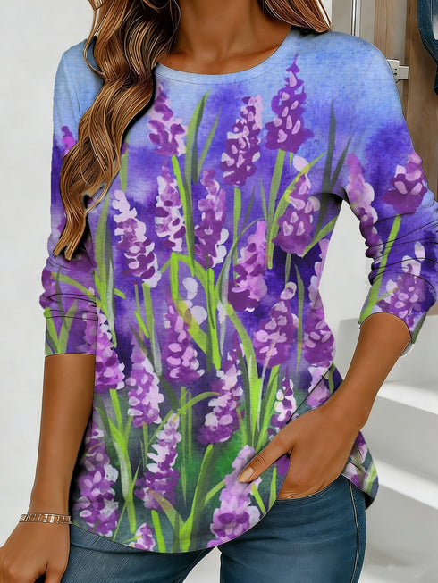 Women's blue floral watercolor print long-sleeved loose-fitting round neck top, casual, everyday, stylish and elegant.