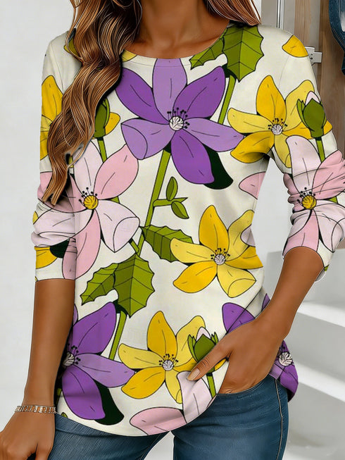 Women's blue floral watercolor print long-sleeved loose-fitting round neck top, casual, everyday, stylish and elegant.