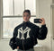 Unisex Black Zip-Up Hoodie with Embroidery Detail