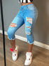 Women’s Ripped Capri Jeans with Raw Hem