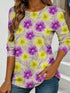 Women's blue floral watercolor print long-sleeved loose-fitting round neck top, casual, everyday, stylish and elegant.