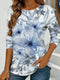 Women's blue floral watercolor print long-sleeved loose-fitting round neck top, casual, everyday, stylish and elegant.