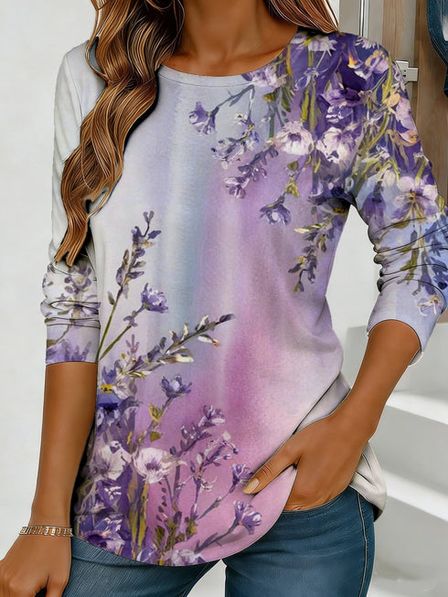 Women's blue floral watercolor print long-sleeved loose-fitting round neck top, casual, everyday, stylish and elegant.