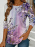 Women's blue floral watercolor print long-sleeved loose-fitting round neck top, casual, everyday, stylish and elegant.